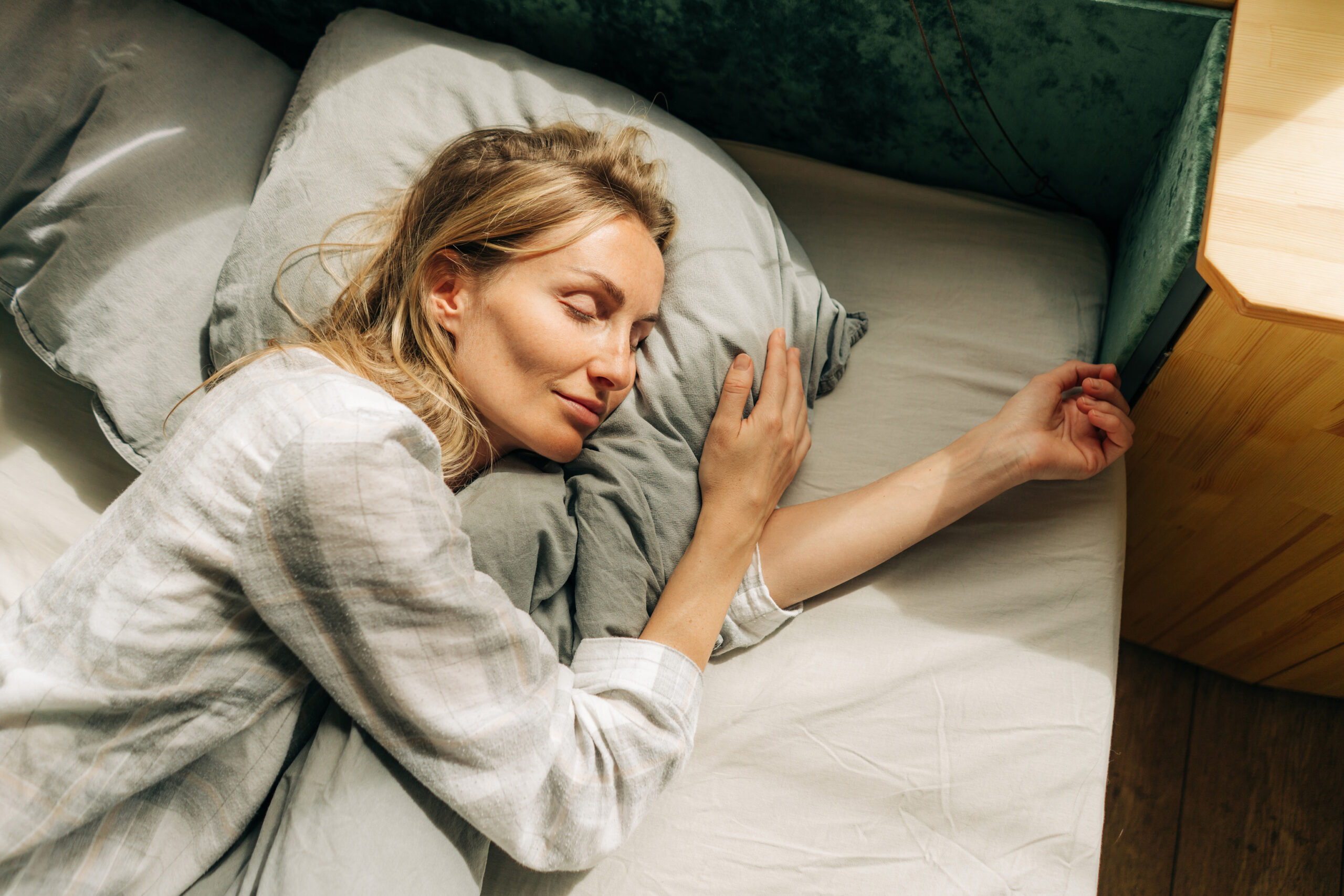 Young caucasian woman is sleeping. The concept of a healthy dayt